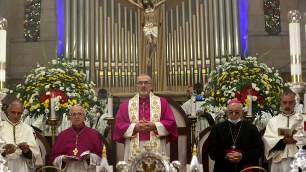 Рождество: фотографии празднеств в Вифлееме и мессы в Ватикане
