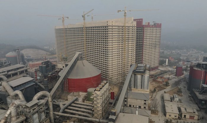 В Китае начинают выращивать свиней в гигантских фермах-небоскребах