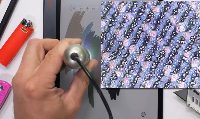 Как выглядят электронные чернила при 230-кратном увеличении